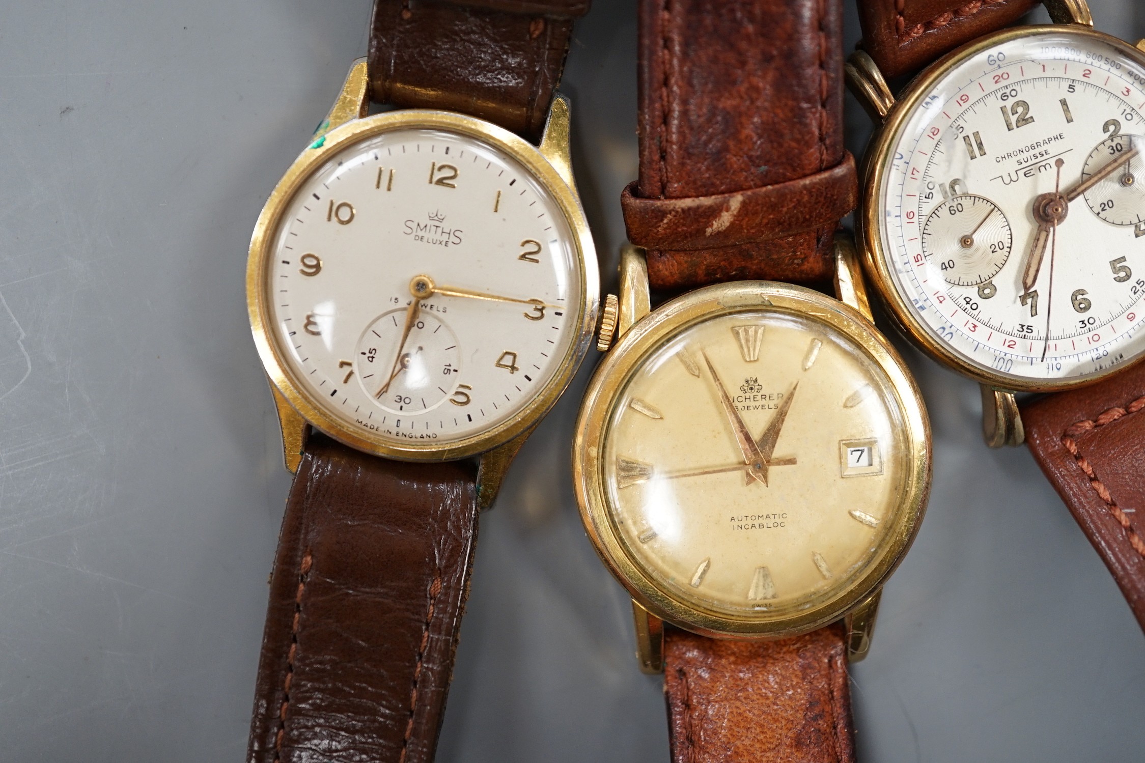 Five gentleman's assorted 1950's and later steel or steel and gold plated wrist watches including Smiths and Bucherer and a lady's 9ct gold wrist watch.